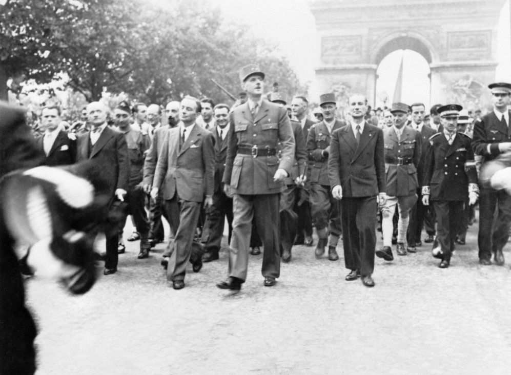 Gen. Charles de Gaulle and his entourage at the Arc de Triomphe, Paris, 26 Aug 1944 (Imperial War Museum: HU 66477)